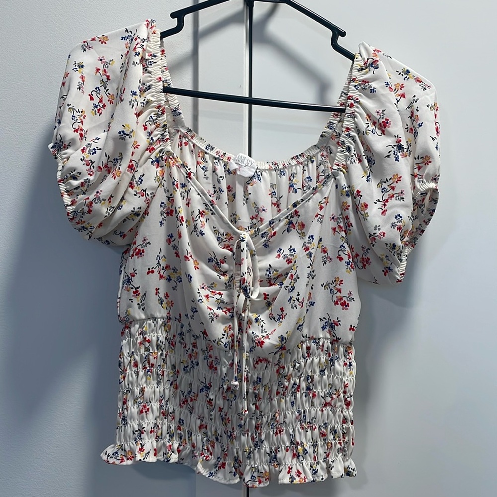 Sienna Sky Floral Print Ruffled Hemline Top